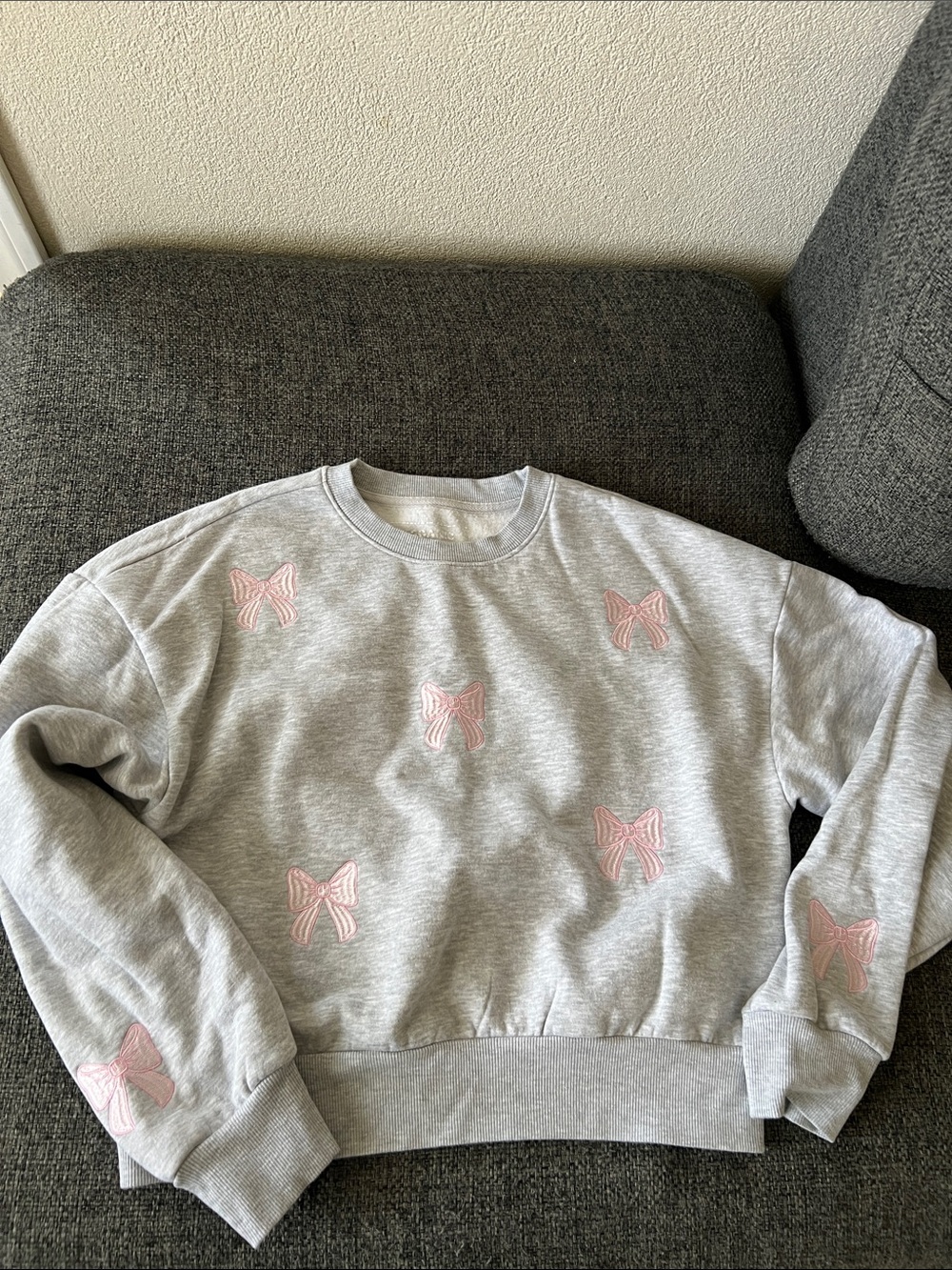 Gray Crewneck Sweater with Pink Bow Accents